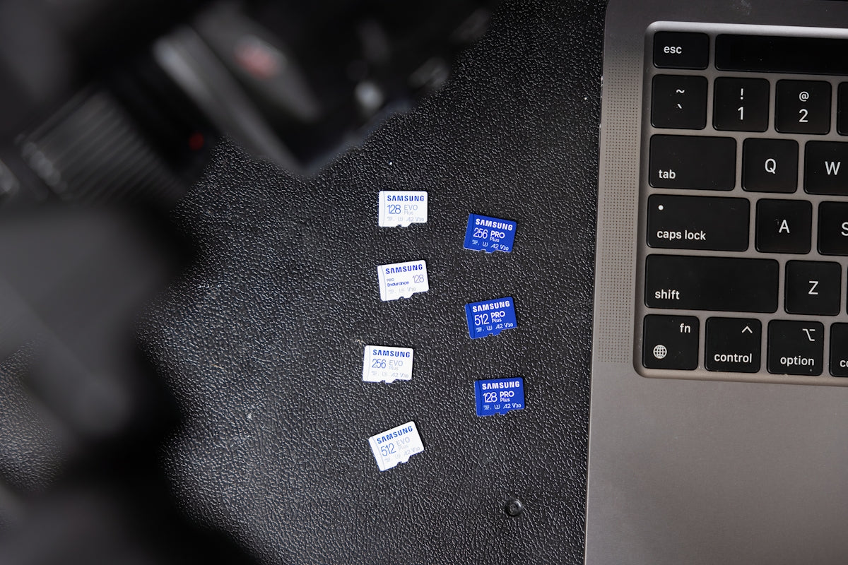 a black keyboard and a black laptop