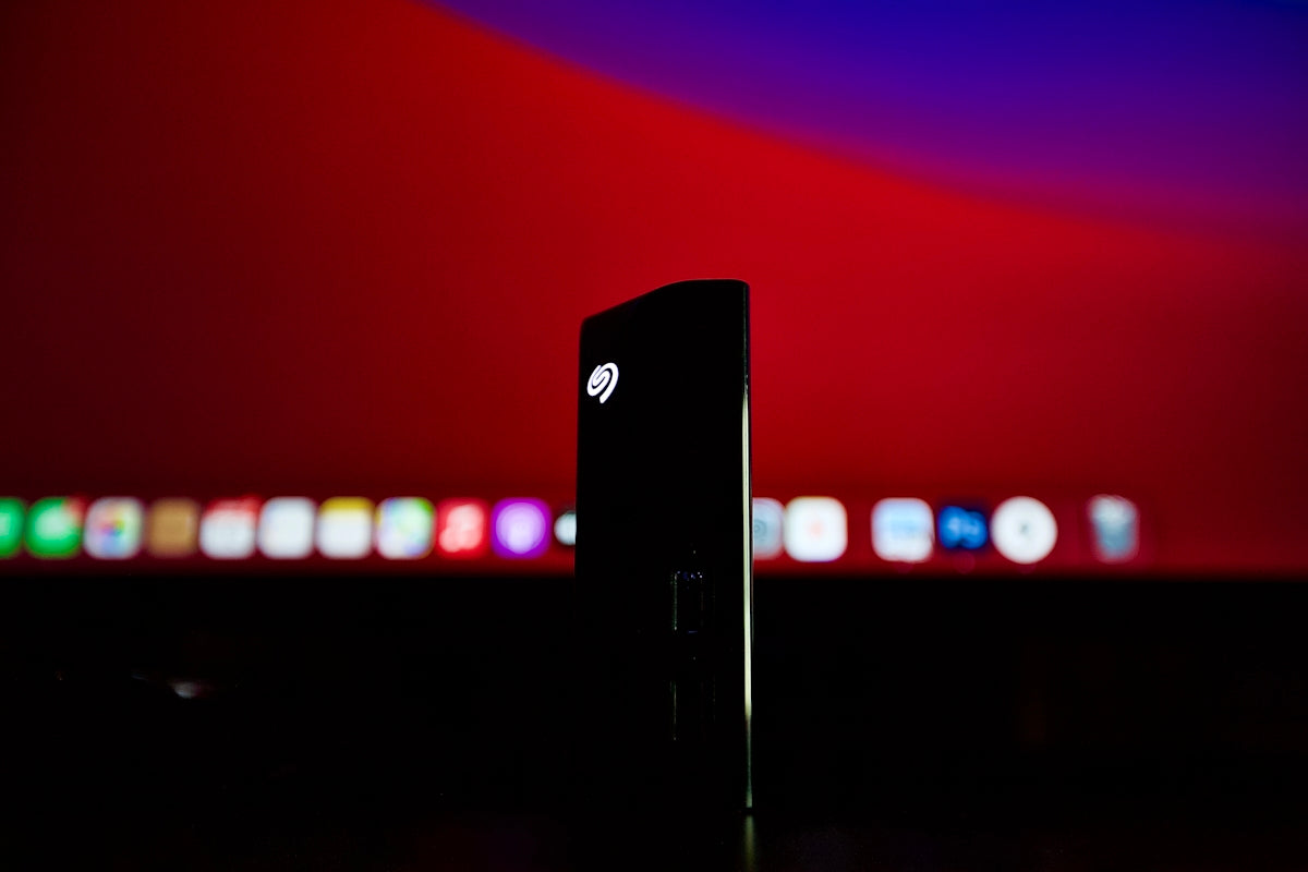black rectangular device on red surface