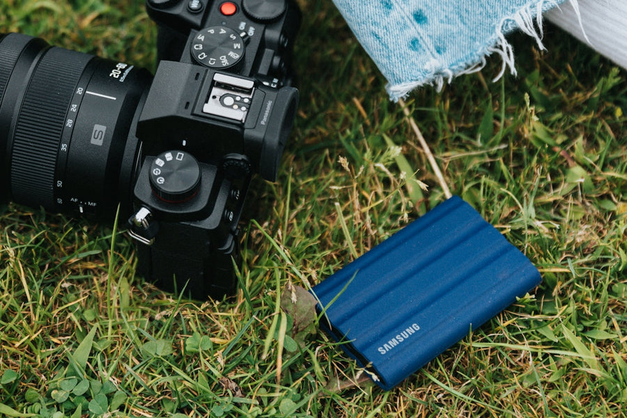 a camera and a camera on grass